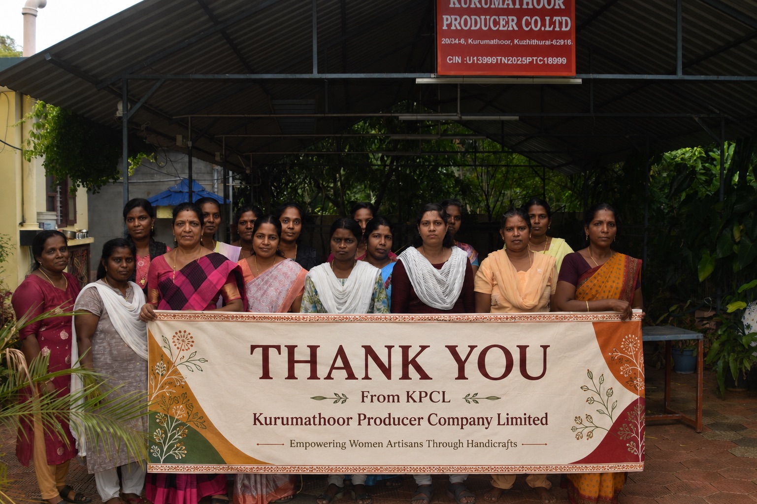 Women artisans standing together at Kurumathoor Producer Company Limited